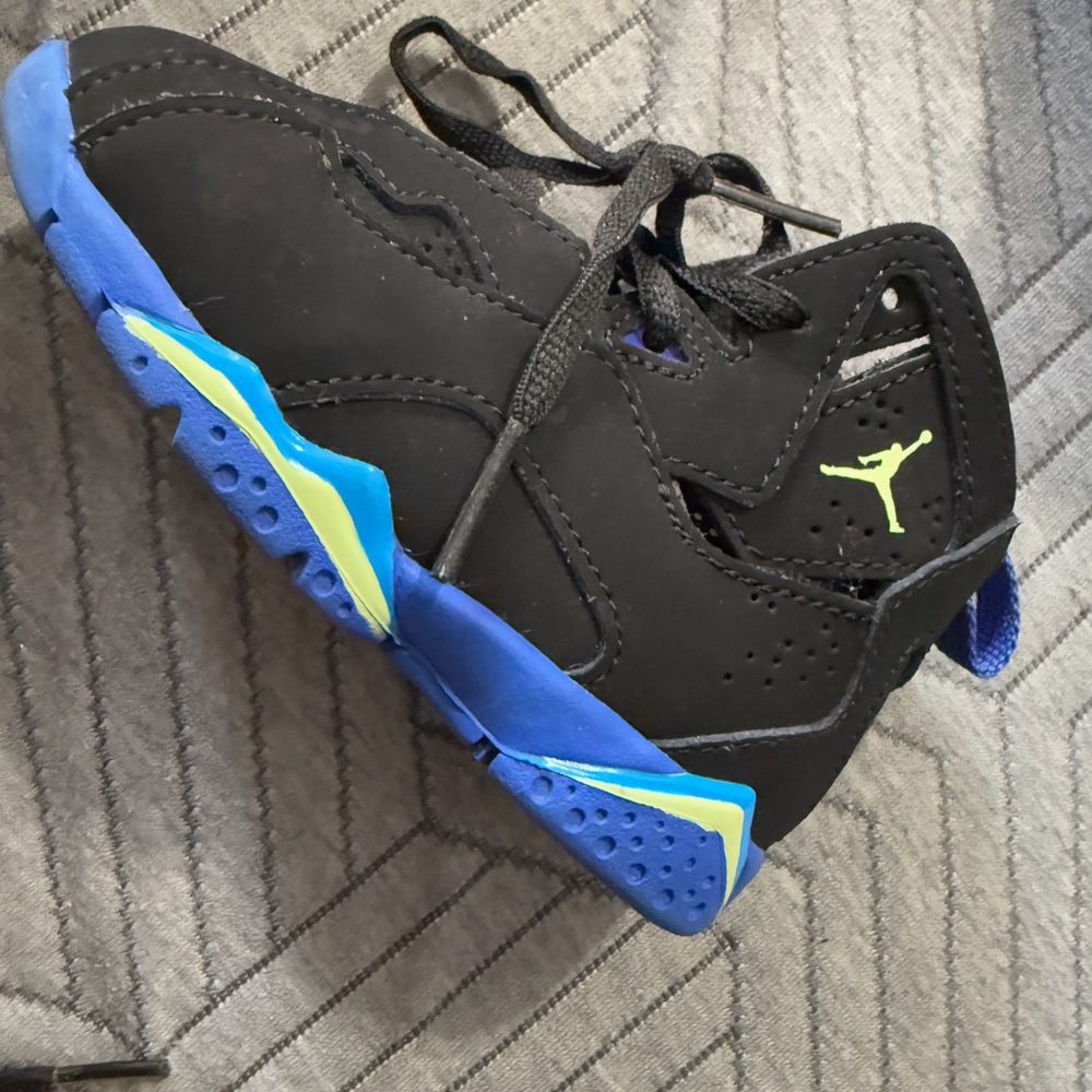 Jordan Blue and Black Sneakers with Vibrant Sole and Performance Design